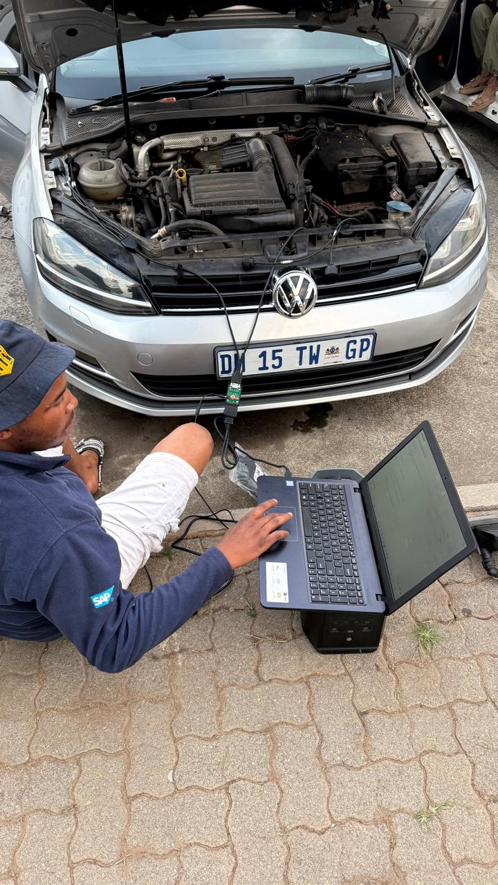 VW Golf ECU diagnostics with laptop
